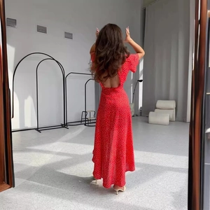 Red polka dot backless maxi dress with puff sleeves and ruffled hem for summer vacation