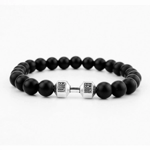 Close-up of matte black beads with silver dumbbell charm featuring Live and Lift engraving