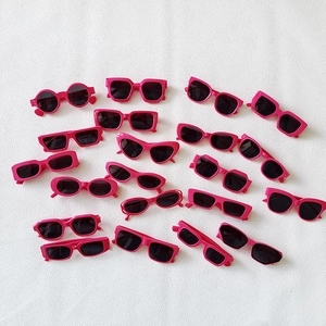 Multiple styles of magenta UV-protective square and round sunglasses for summer