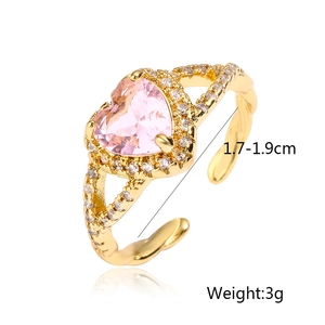 Detail of pink heart zircon ring in 18K gold plating with adjustable open band and size specs