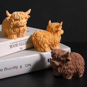 Detailed view of highland cow molds showing realistic hair texture and horn features