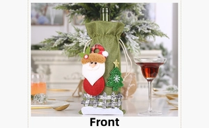 Detailed front view of green burlap wine bottle cover with 3D Santa and white fence