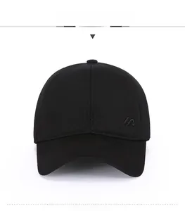 Close-up of black wool baseball cap featuring premium embroidery and structured crown