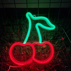 Cherry shaped LED neon light with red fruit and green leaves in a rustic basket