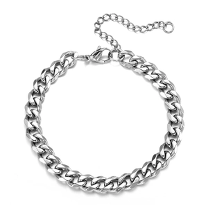 Polished silver stainless steel Cuban link bracelet with lobster clasp on white background