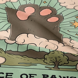 Detail shot showing the soft texture and artistic cat paw print of this bohemian tapestry