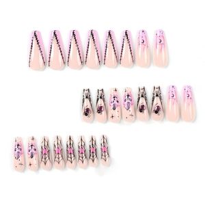 Pink Halloween coffin press-on nails with spider web, skull and flame designs