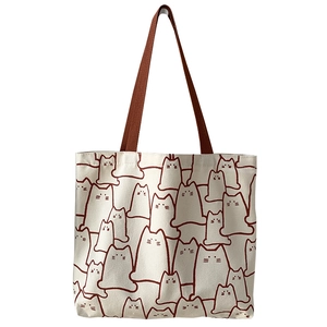 Large beige canvas tote bag with brown cat print for students, minimalist shoulder bag style