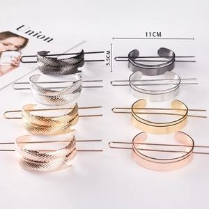 Detailed size specifications for metal feather hairpins in four elegant metallic finishes