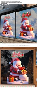 Close-up of Santa Claus and snowman static window stickers for Christmas decor