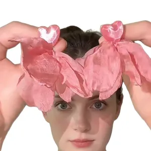Exaggerated pink heart earrings with silk petal fringe for beach resort and party style