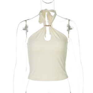 Detail of cream halter top featuring a stylish metal ring buckle and slim-fit ribbed fabric