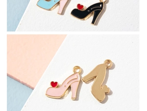 Detail showing pink and black enamel high heel charms with red hearts for DIY jewelry