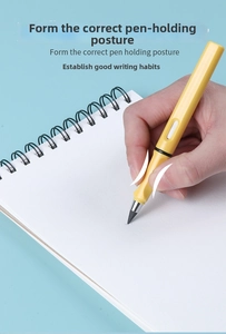 Ergonomic yellow inkless pencil designed for posture correction on white notebook