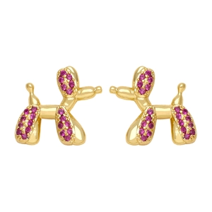 Detail of cute balloon dog stud earrings with golden finish and purple zirconia stones