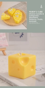 Detailed close-up of yellow cheese-shaped scented candles in cube and heart styles