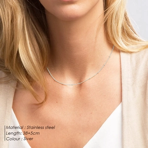 Minimalist silver stainless steel bead chain necklace for women shown on model