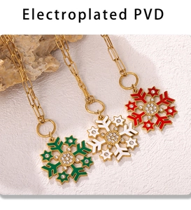 Detailed PVD plated necklaces featuring zircon snowflake pendants in red, white and green enamel