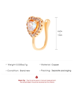 Detail of copper U-shaped nose clip with heart zircon stone and dimensions of 1.2cm