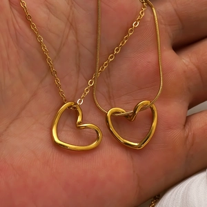 18K gold plated stainless steel open heart necklace with asymmetric double chain design