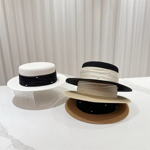 Elegant French boater hat set with pearl ribbons for summer outdoor sun protection