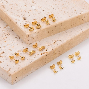 Gold stainless steel stud earring set with heart moon and leaf shapes on stone
