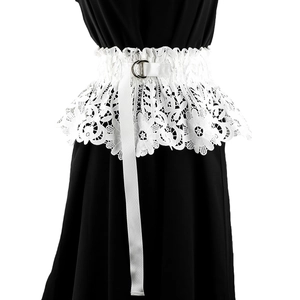 Close-up of white lace corset belt featuring silver double round buckle on a shirt