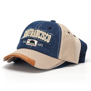 Detail of vintage baseball cap with San Francisco embroidery and distressed polar bear patch