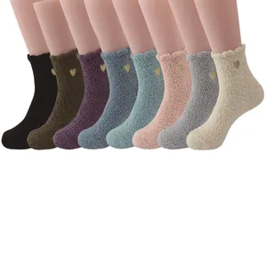 Fuzzy coral fleece crew socks for women featuring embroidered hearts in 8 assorted colors