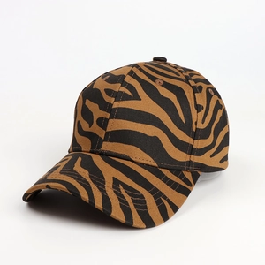 Detail view of the brown and black animal print pattern on this classic baseball cap