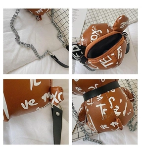 Detailed four-way view of brown PU leather bear bag with white graffiti and silver chain