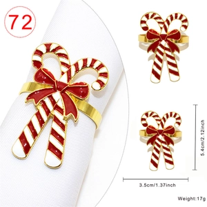 Christmas candy cane napkin ring with red bow and gold trim details for table decor