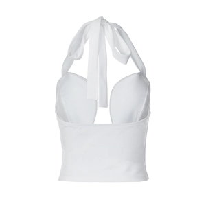 Flat lay of a white halter neck top with cut-out design and wired cups for women