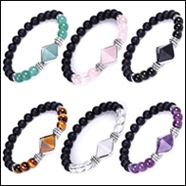 Detailed view of six colors of 8mm lava stone and tiger eye beaded bracelets with metal spacers