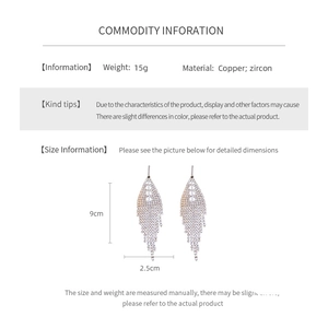 Detailed size specifications for triangular tassel earrings with zircon and copper dimensions
