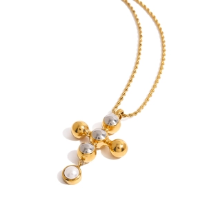 Collier croix luxueux en acier titane doré et argenté avec une chaîne en or élégante