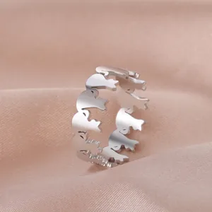 Cute cartoon cat silhouette open ring in silver stainless steel on pink silk background