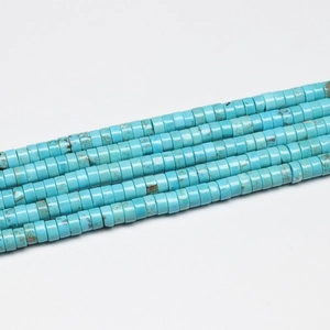 Close-up of natural blue turquoise heishi disc beads for DIY jewelry making
