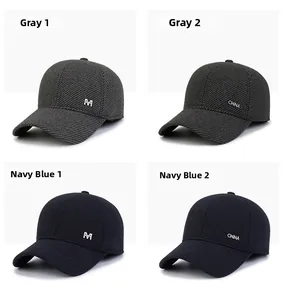 Detailed grid of men's winter baseball caps in grey and navy with metallic M logo