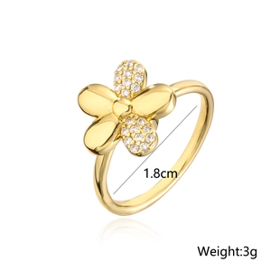 Detailed size view of an 18K gold-plated rotating flower ring with cubic zirconia stones