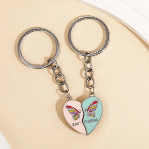Detail of magnetic heart butterfly keychains with BEST FRIENDS engraving