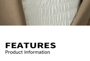 Detail showing white pleated smocking fabric paired with a stylish brown blazer jacket