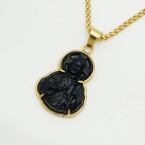 Gold plated Saint Jude pendant with black glass inlay on woven chain necklace