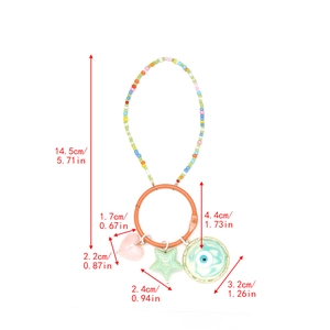 Detailed view of colorful beaded keychain with heart, star, and evil eye charms with size