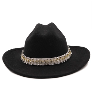 Close-up of black wool felt jazz hat featuring silver studs and rhinestone band details