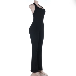 Side view of black halter neck jumpsuit with flared legs on mannequin