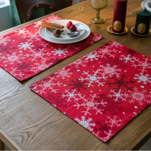 Christmas red snowflake placemats set for holiday dining table decor in warm scene