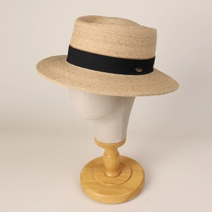 Classic raffia boater hat for men featuring a black grosgrain ribbon and golden logo pin