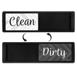 Black sliding dishwasher magnet with Clean and Dirty indicators on wood grain background