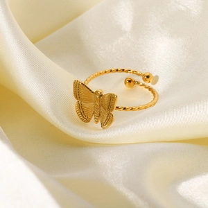 Bague papillon ouverte plaquée or 18K avec anneau torsadé sur soie beige
